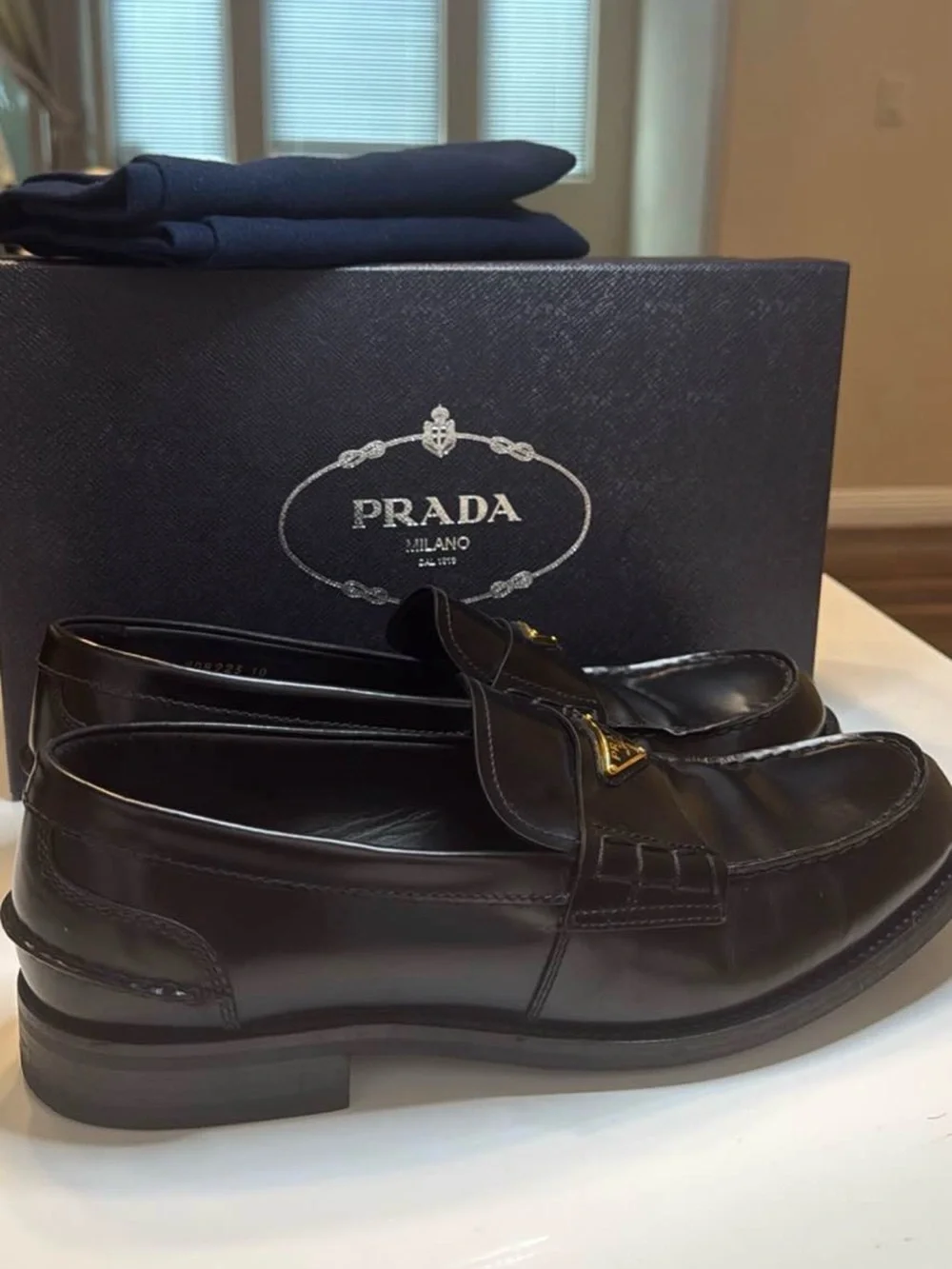 Prada Black Leather Men's Slip-On Loafers with Gold Logo